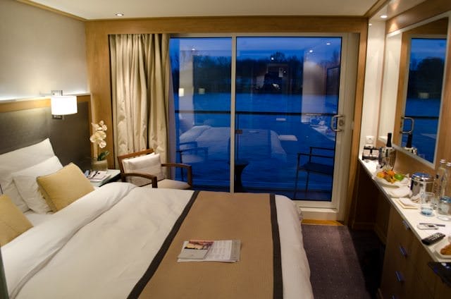 One of the balcony staterooms aboard Viking Freya. Complimentary bottled water and wi-fi internet access are offered in all staterooms. Photo © 2012 Aaron Saunders