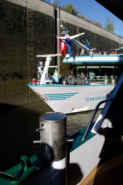 Coming into a lock alongside another river cruise vessel. Locks typically represent the largest choke point along Europe's waterways - not berths. Photo © 2013 Aaron Saunders