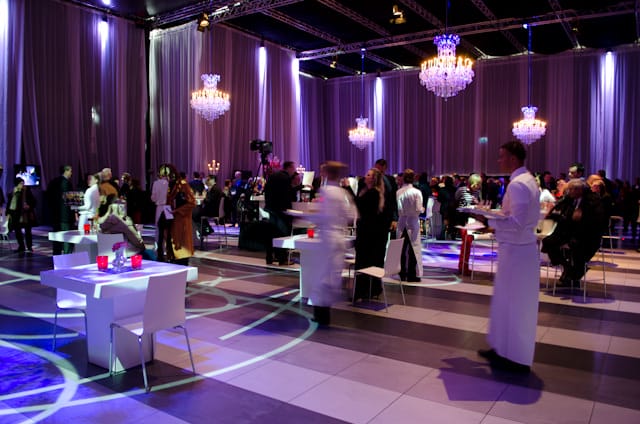 The ceremonies began inside Passenger Terminal Amsterdam, where waiters ferried champagne to guests on-hand to witness this historic event. Photo © 2013 Aaron Saunders