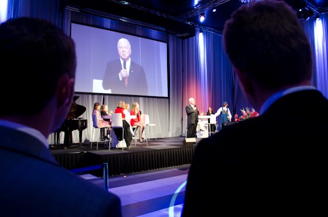 Viking River Cruises founder Torstein Hagen takes the stage. Photo © 2013 Aaron Saunders