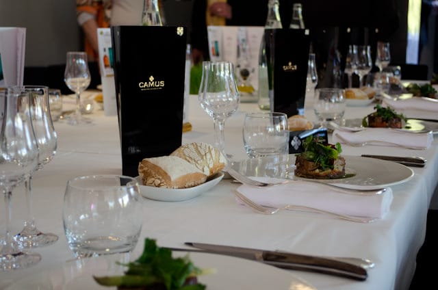 Enjoying a sumptuous four-course lunch, each paired with a different type of CAMUS Cognac. Photo © 2014 Aaron Saunders