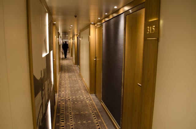 Welcome aboard! Stateroom corridors and furnishings are decidedly Scandinavian and Longship-esque, but with several pleasant differences. Photo © 2014 Aaron Saunders
