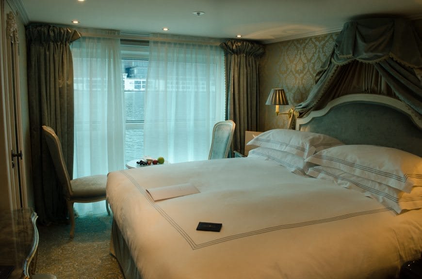 Home Suite Home: My Category 2 Stateroom on Deck 3 is surprisingly opulent. Check out the sumptuous bed! Photo © 2015 Aaron Saunders