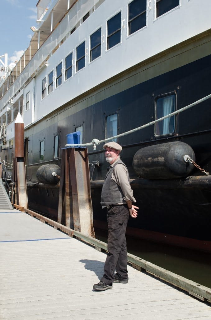 Historical Leader Kenne stands pierside as guests board the jetboat for our full-day tour of Hell's Canyon. Photo © 2015 Aaron Saunders