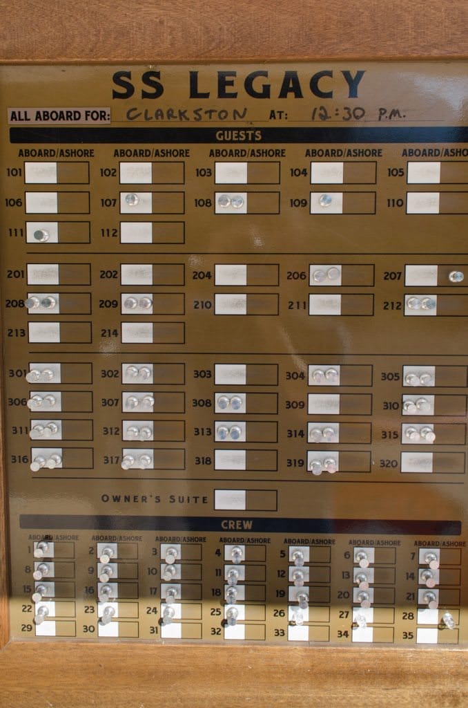 Guests aboard the S.S. Legacy use a simple peg-board style system to mark themselves as "Onboard" or "Ashore". Don't forget to move your peg! Photo © 2015 Aaron Saunders