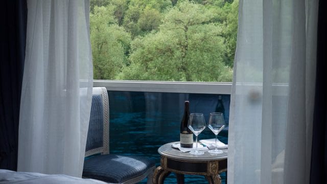 Uniworld's balcony featured retractable mosquito netting. © 2015 Ralph Grizzle