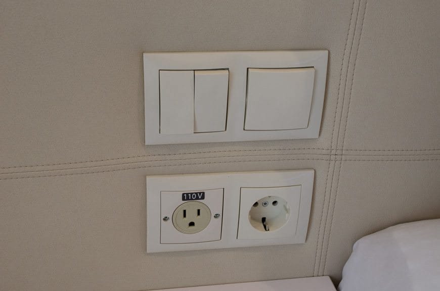 Never out of reach: bedside power outlets and lighting controls. Photo ©  2015 Aaron Saunders