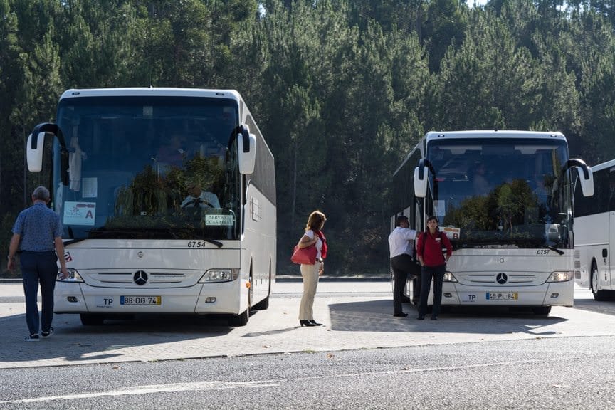 Coaches await the return of their guests as we continue our journey to Coimbra and Porto. Photo © 2015 Aaron Saunders