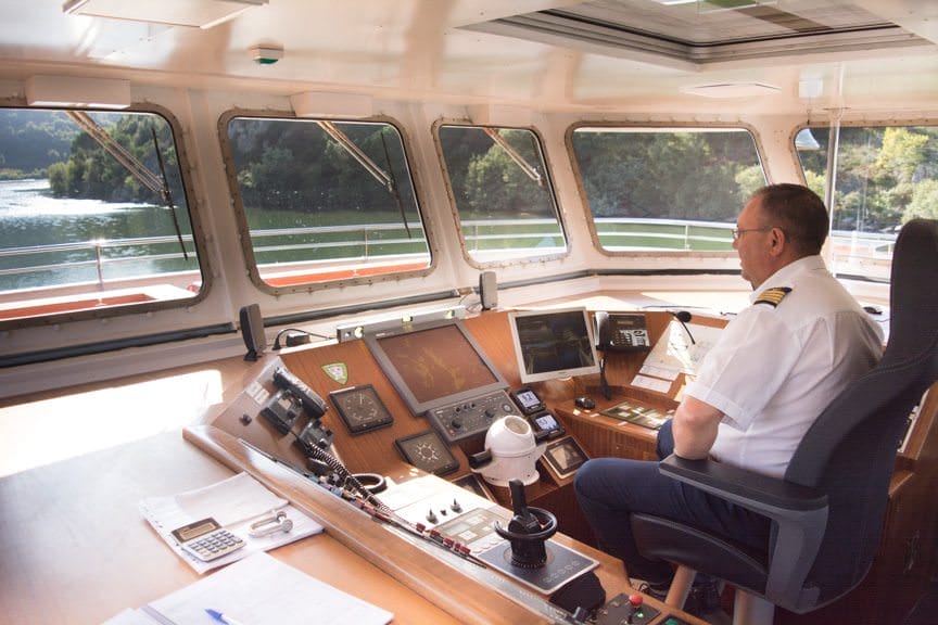 Our Captain in the wheelhouse of the Viking Torgil. By law, ships on the Douro are not allowed to sail at night. Photo © 2015 Aaron Saunders