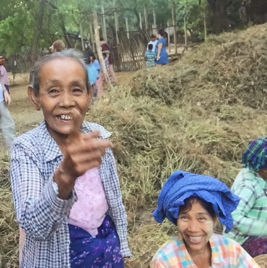 This village elder didn't quite understand the iPhone selfie trick as well as the kids did and so she shied away. When I flipped it and showed her what I was up to, however, she laughed deeply, pointed at her own face, and hit the woman next to her on the shoulder as if to say, "LOOK! IT'S ME!" © 2015 Gail Jessen