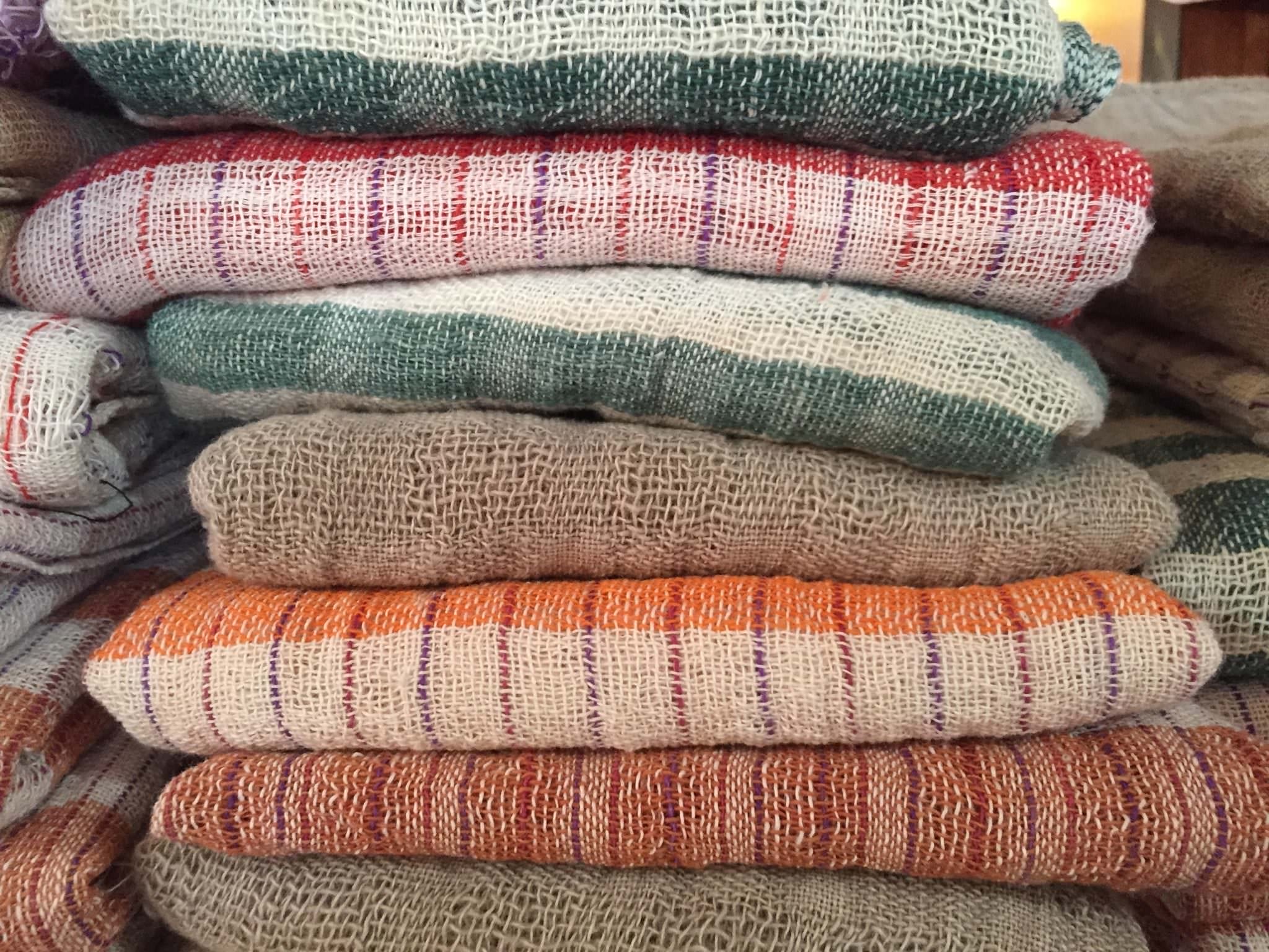 Row upon row upon row of unique scarves waiting for you to come buy one! © 2015 Gail Jessen