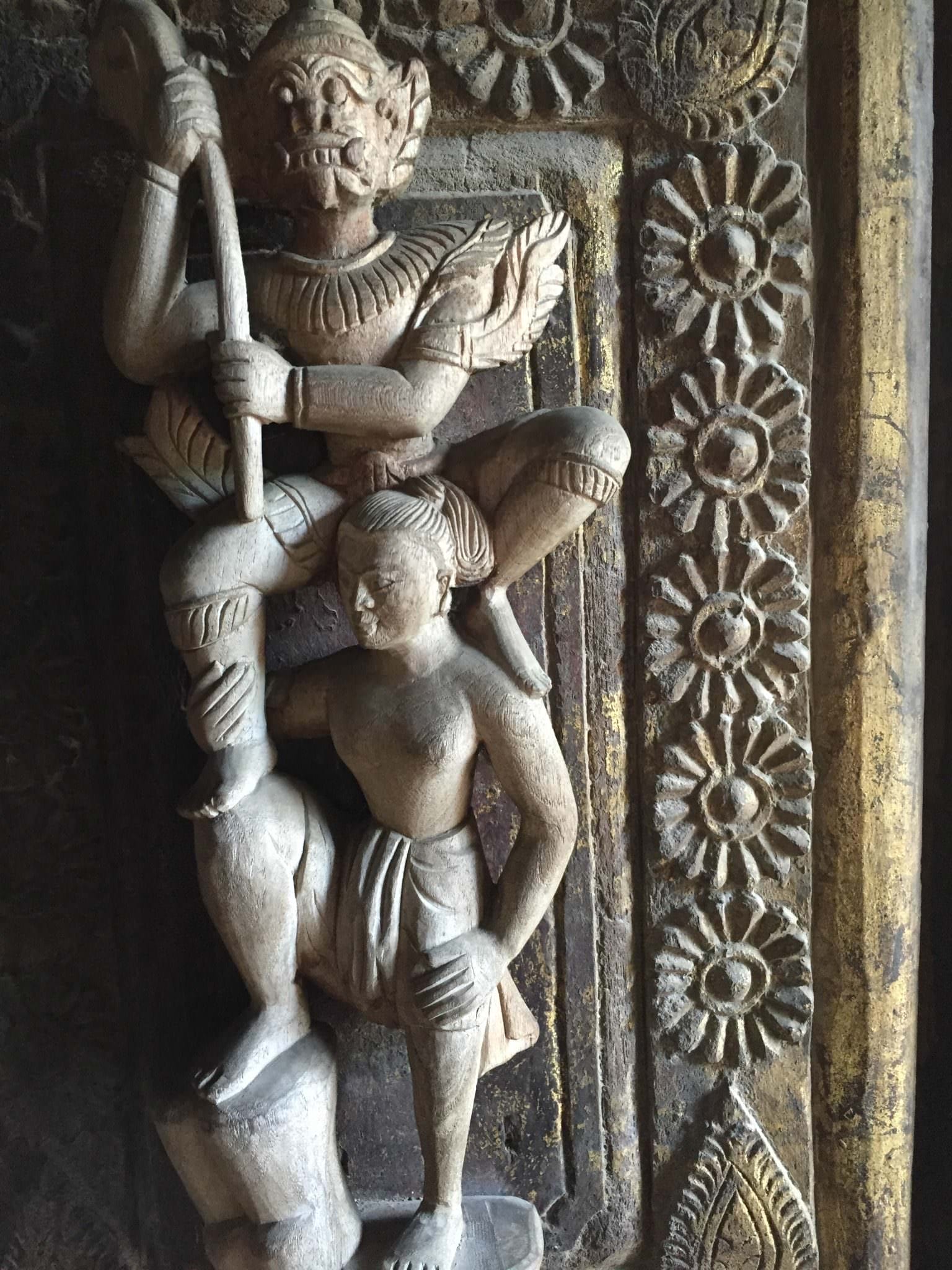 3-dimensional carvings on Mandalay's Golden Palace. You can still see hints of the gold leaf that once covered the entire structure. © 2015 Gail Jessen