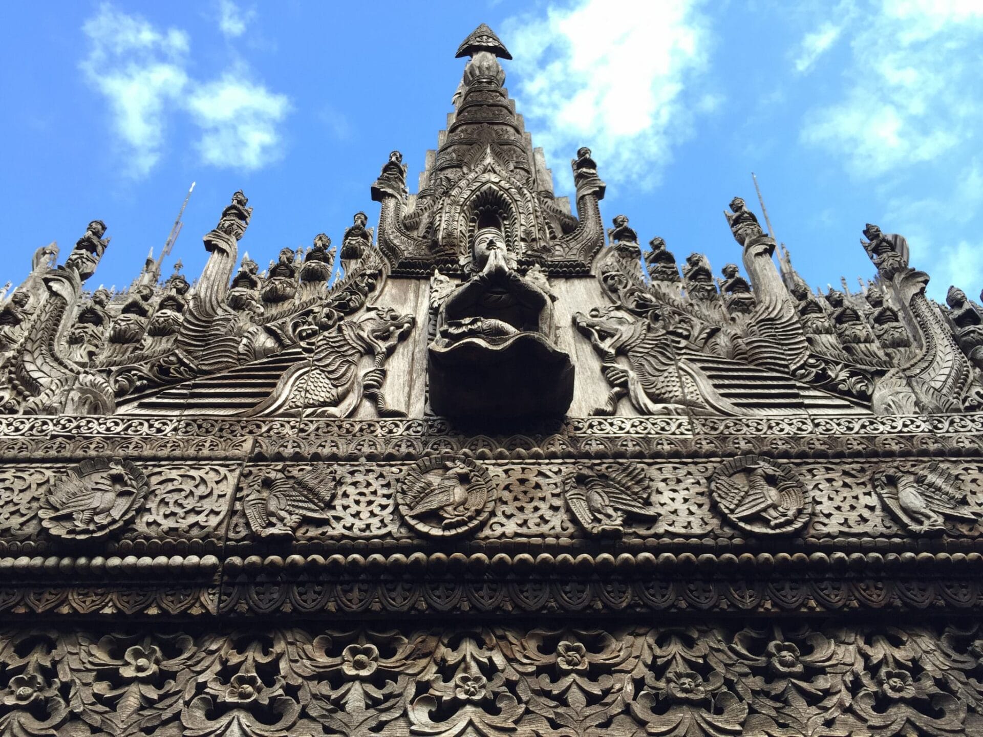 Teak wood carving from base to tip make the Palace a unique sight. © 2015 Gail Jessen