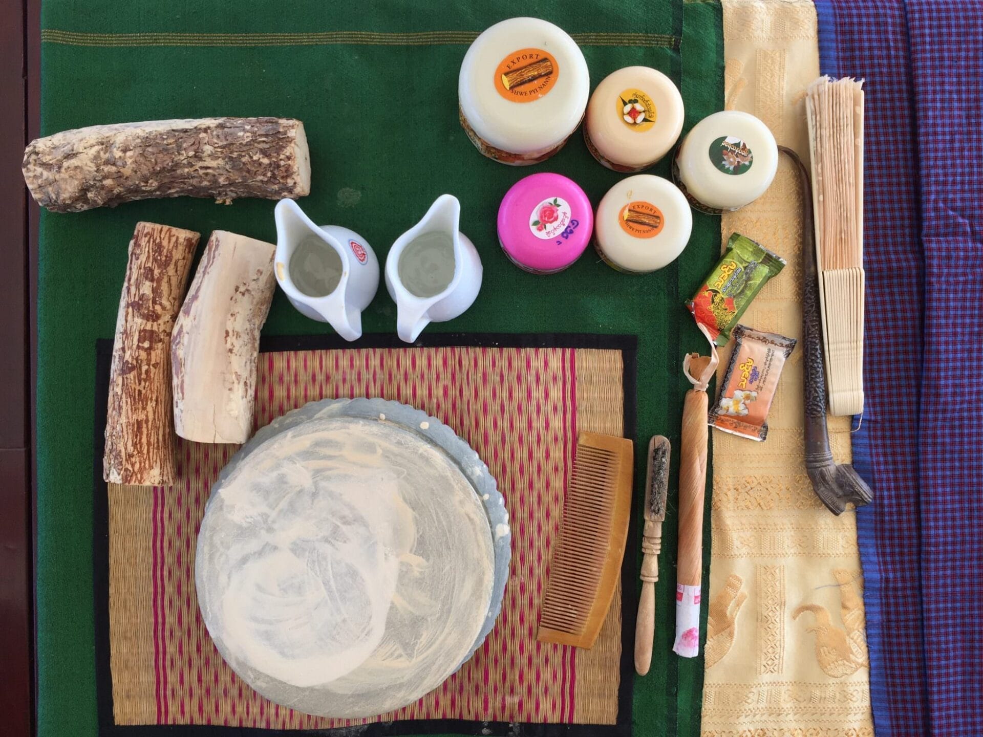 Stumps of the thanaka tree are set for our demonstration on the mysterious beauty cream. © 2015 Gail Jessen
