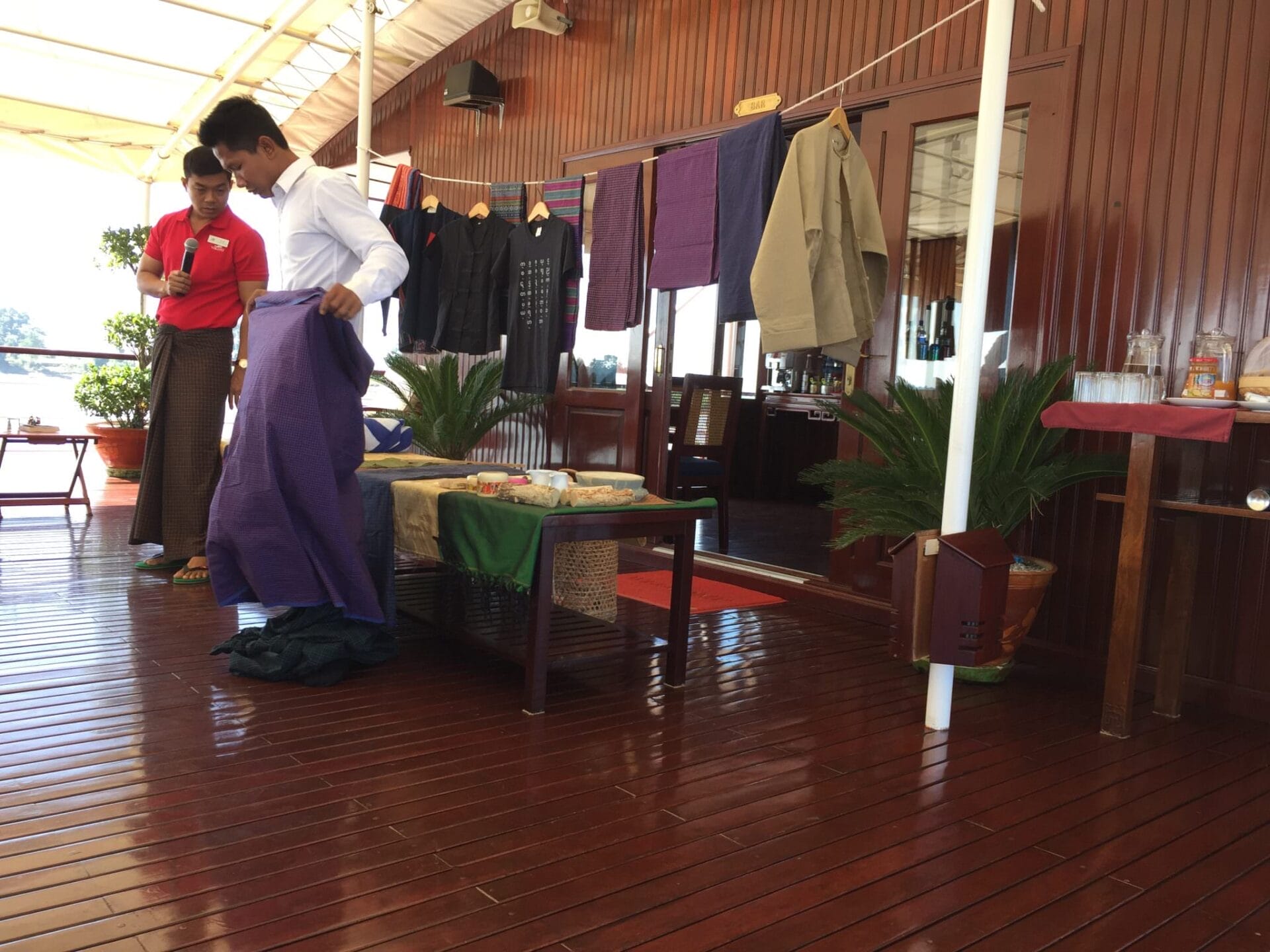 Justin demonstrates the wrapping technique on traditional Burmese longhi.