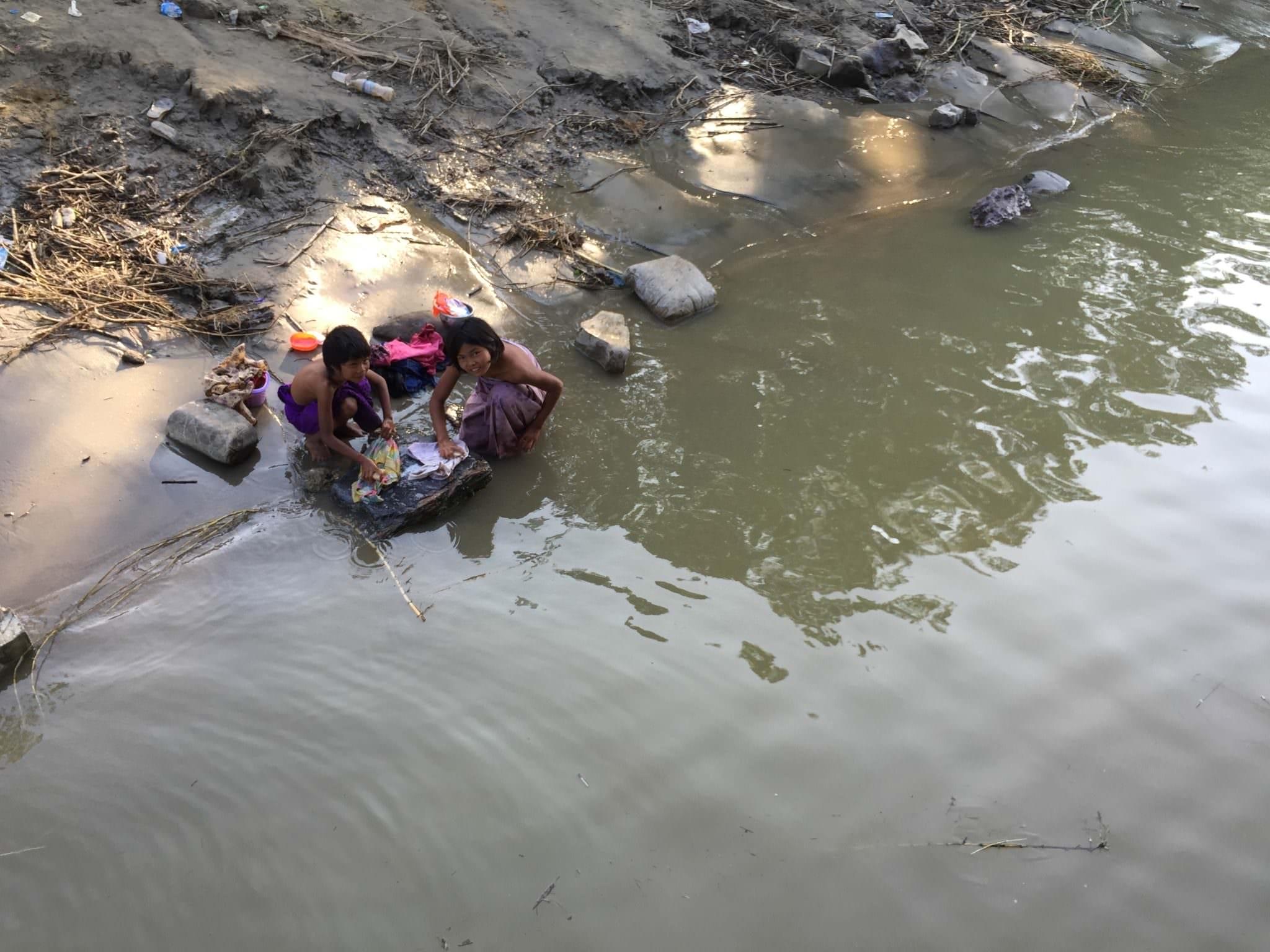 Children from Ohn Ne Choung village were busy with laundry when we pulled up outside their home. © 2015 Gail Jessen