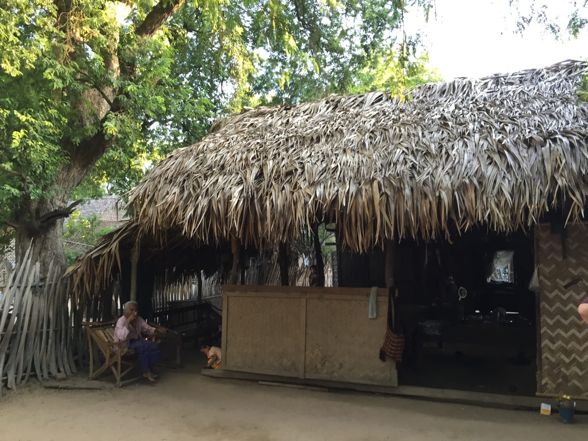Every home looked the same, varying only in size. Thatched roofs, woven bamboo siding, no electricity or running water. © 2015 Gail Jessen