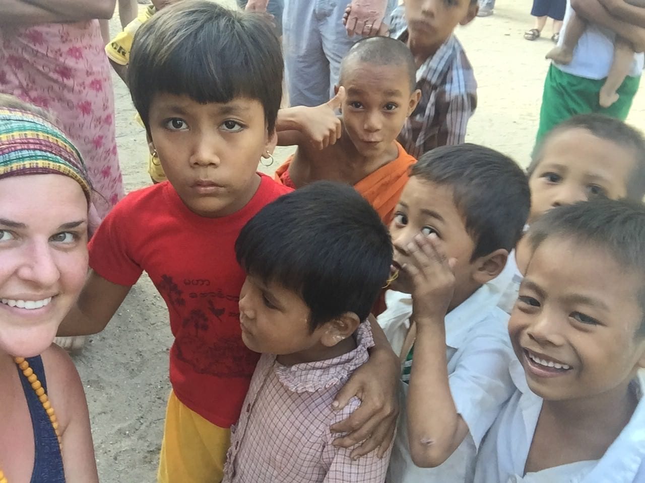 I ended up with about 203 photos of kids and/or me with the kids. The first time I kneeled down to get in a photo with them, it felt as though the entire village ran over to shove themselves into the frame. My guess is it's rare for occasional tourists to get down on their level and play. I love the little boy staring at my white skin, just mesmerized by this weird giant in his village. © 2015 Gail Jessen