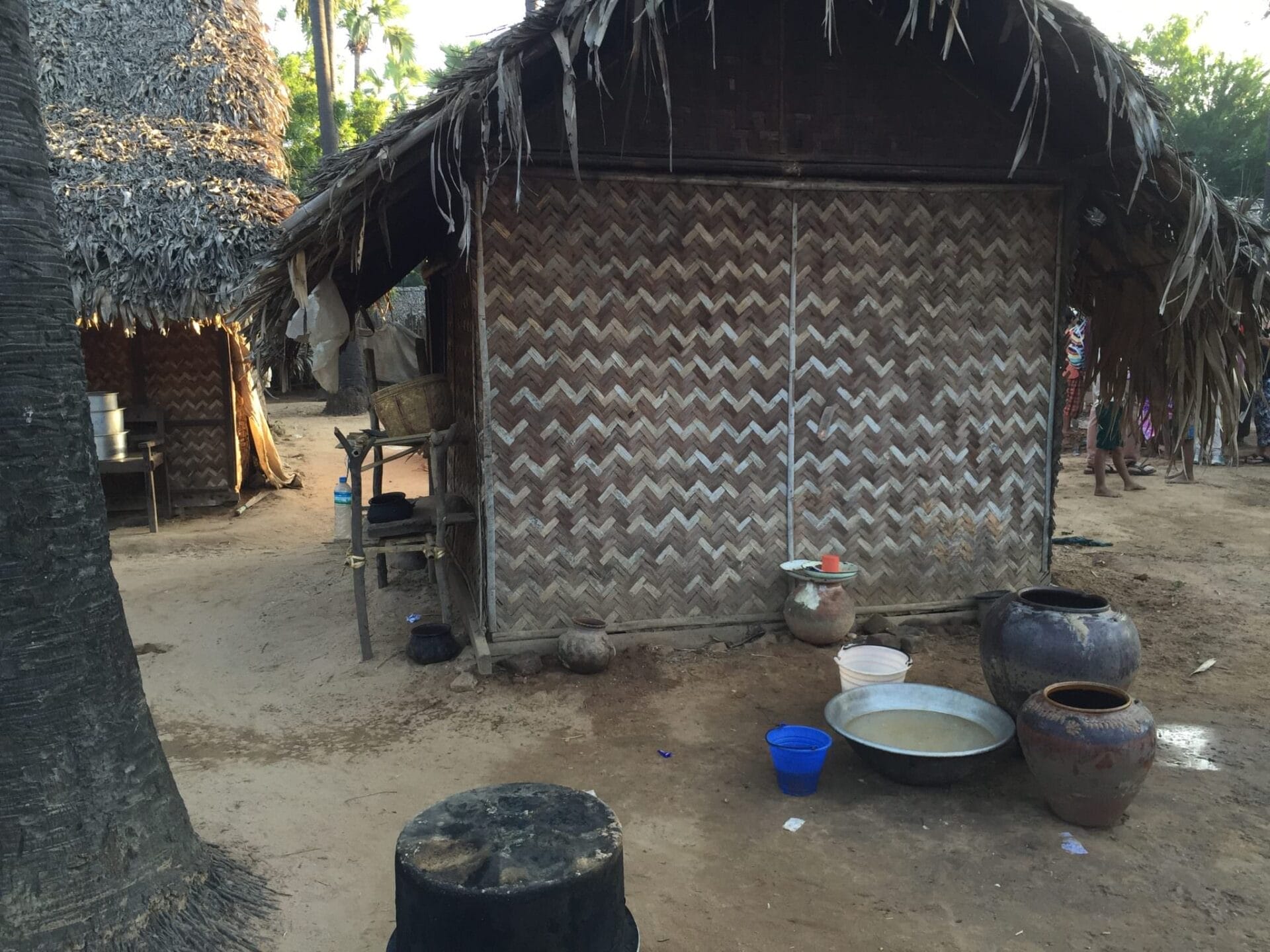 A kitchen outside a home in Ohn Ne Choung. It is common for many generations of a family to live in the same home. © 2015 Gail Jessen
