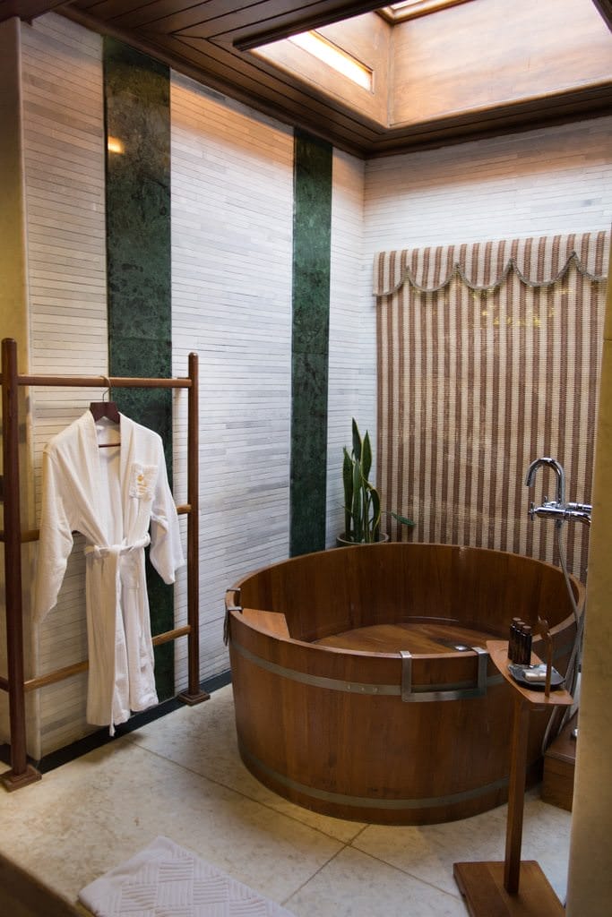 My cavernous bathroom features a huge wooden tub...Photo © 2015 Aaron Saunders