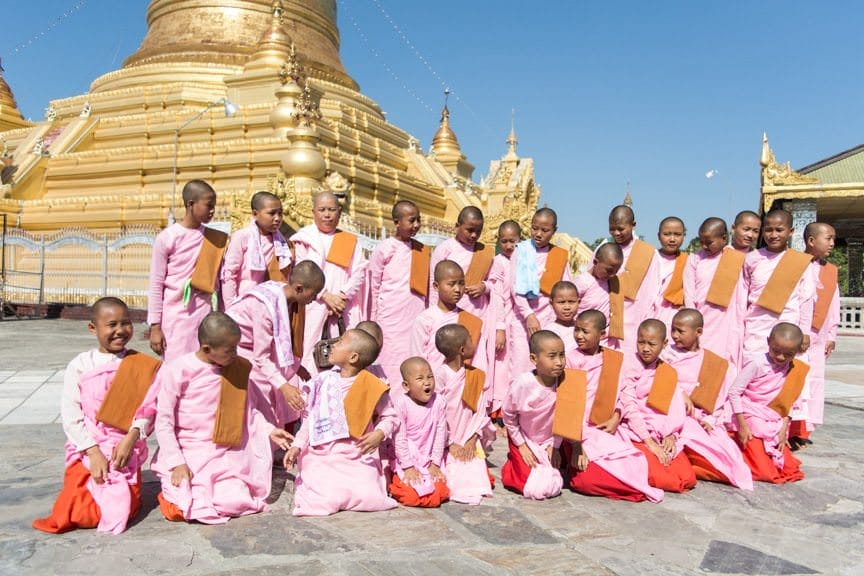 Young Buddhist monks pose for us...Photo © 2015 Aaron Saunders