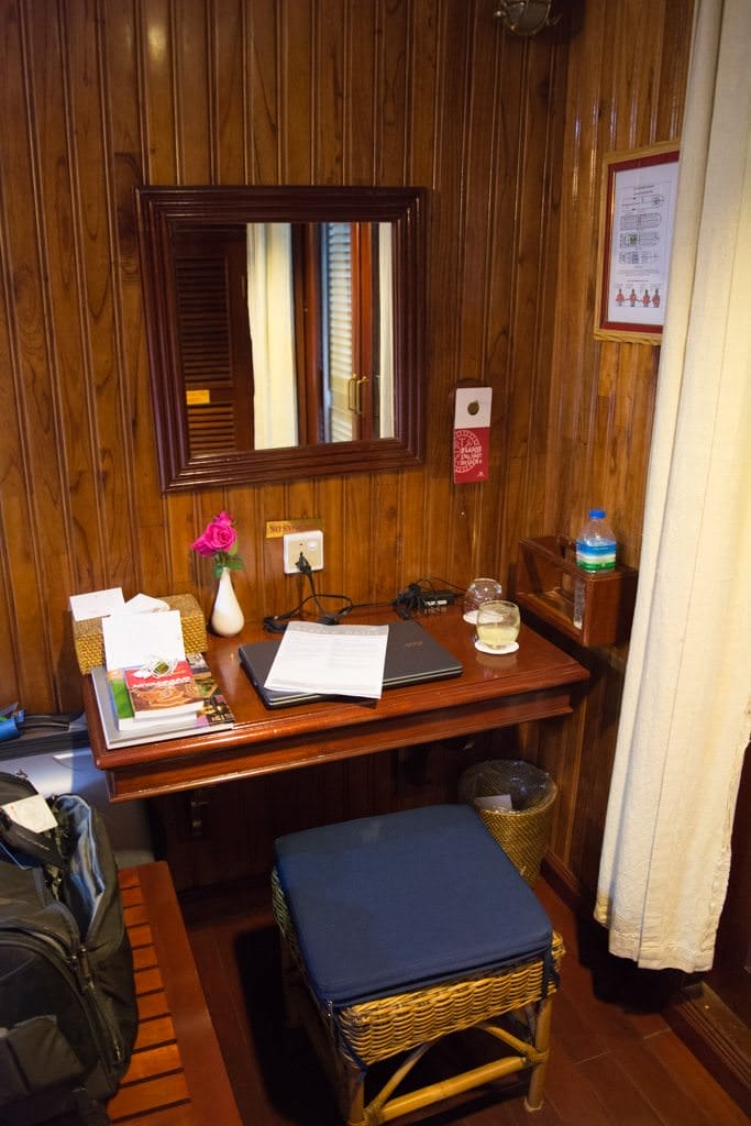 A small desk is big enough for a laptop computer and several books, and the foot of the bed has some storage space for luggage. Note that there is no under-bed storage on Viking Mandalay. Photo © 2015 Aaron Saunders