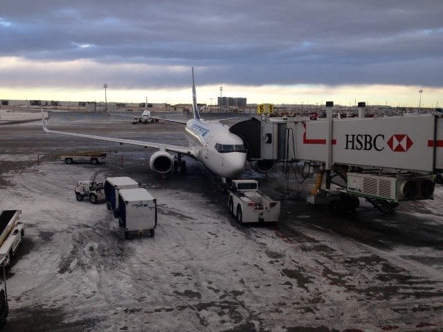 Brr! My journey began in Calgary, Canada, where fresh snowfall would provide an interesting contrast to my final destination. Photo © 2015 Aaron Saunders