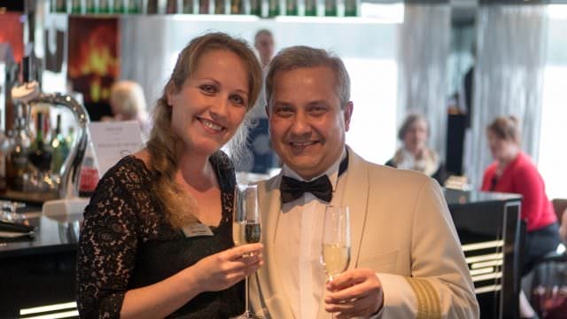 Cruise Director Jana Pakstaitis with Emerald Sky 's captain. © 2016 Ralph Grizle