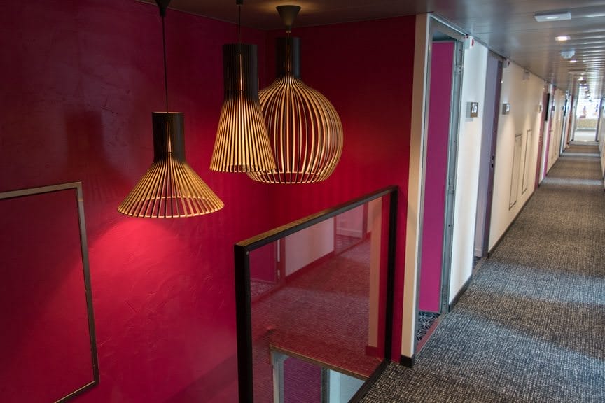 Corridors are vibrant and colorful. Photo © 2016 Aaron Saunders