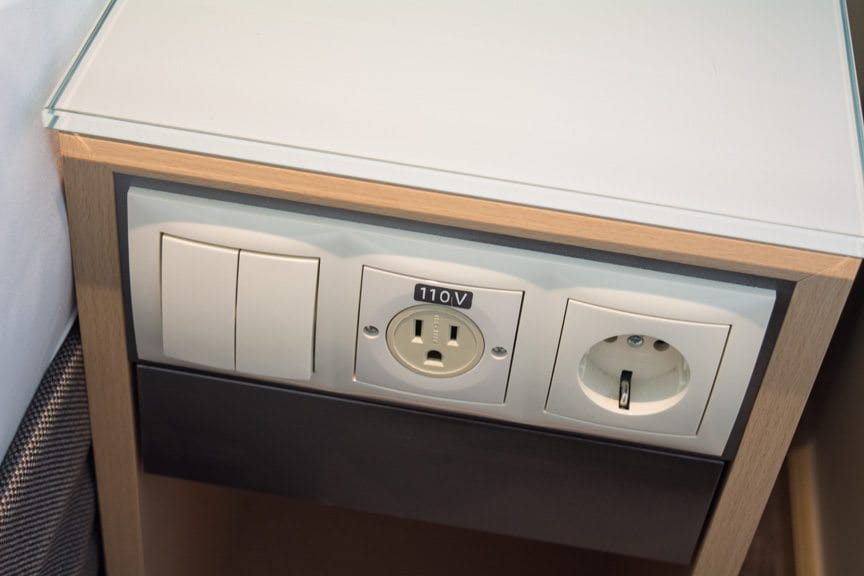 More handy touches: North American and European-style power outlets. I can't tell you how many times Viking has changed or re-positioned these on newer vessels as a result of guest feedback. Photo ©  2016 Aaron Saunders