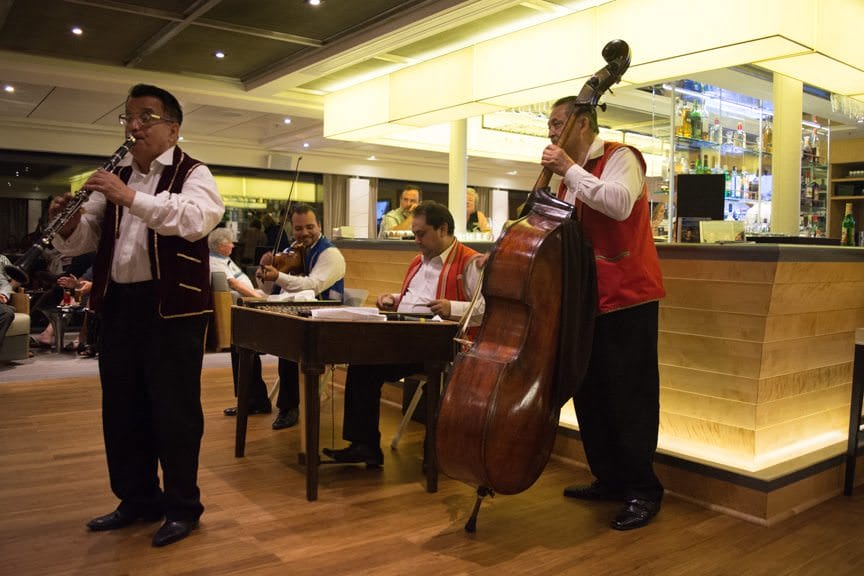 After dinner, there's time for one last local musical performance...Photo ©  2016 Aaron Saunders