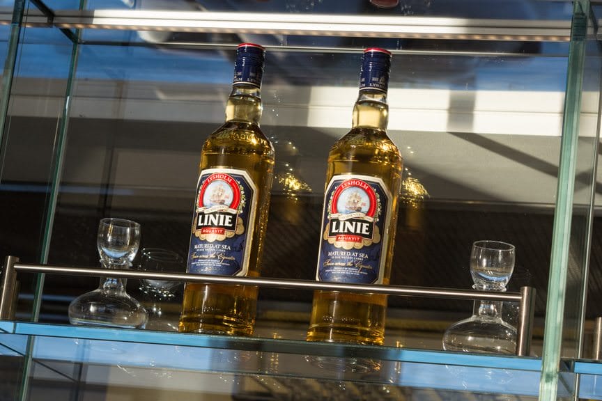 Viking also pays homage to its Norwegian heritage by stocking Linie Aquavit onboard. A distilled Norwegian spirit, it is said that the Linie Aquavit has to sail across the equator twice, and only then can it be shipped for sale and consumed. Photo ©  2016 Aaron Saunders
