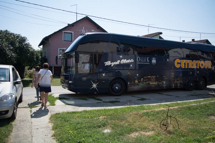 An odd sight: a 60-guest motorcoach pulling up on a residential street. Photo ©  2016 Aaron Saunders