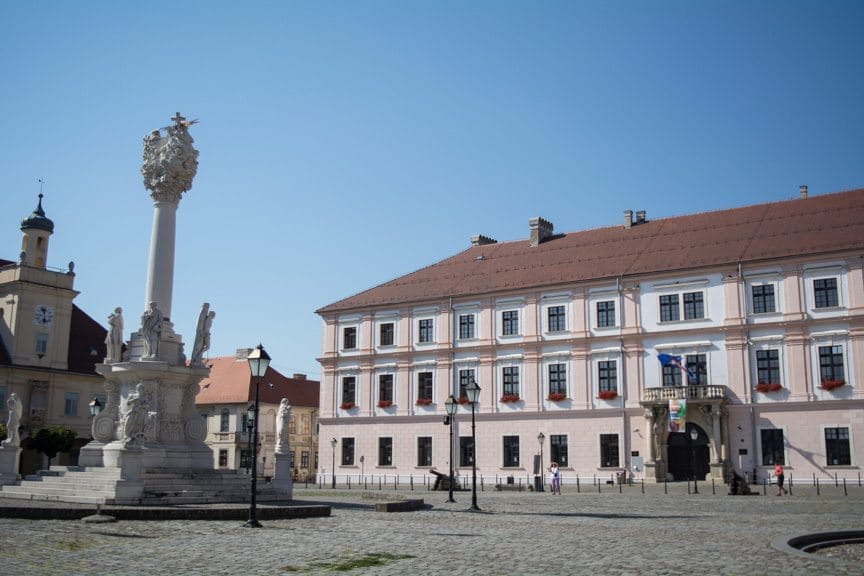 Osijek's historic Old Town square. The monument to the left is a recreation; the original was destroyed in 1992. Photo © 2016 Aaron Saunders