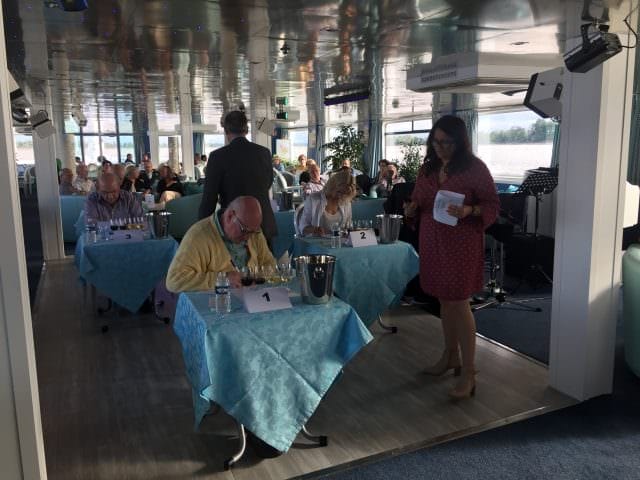 Wine games and tastings during our scenic sailing. © 2016 Ralph Grizzle