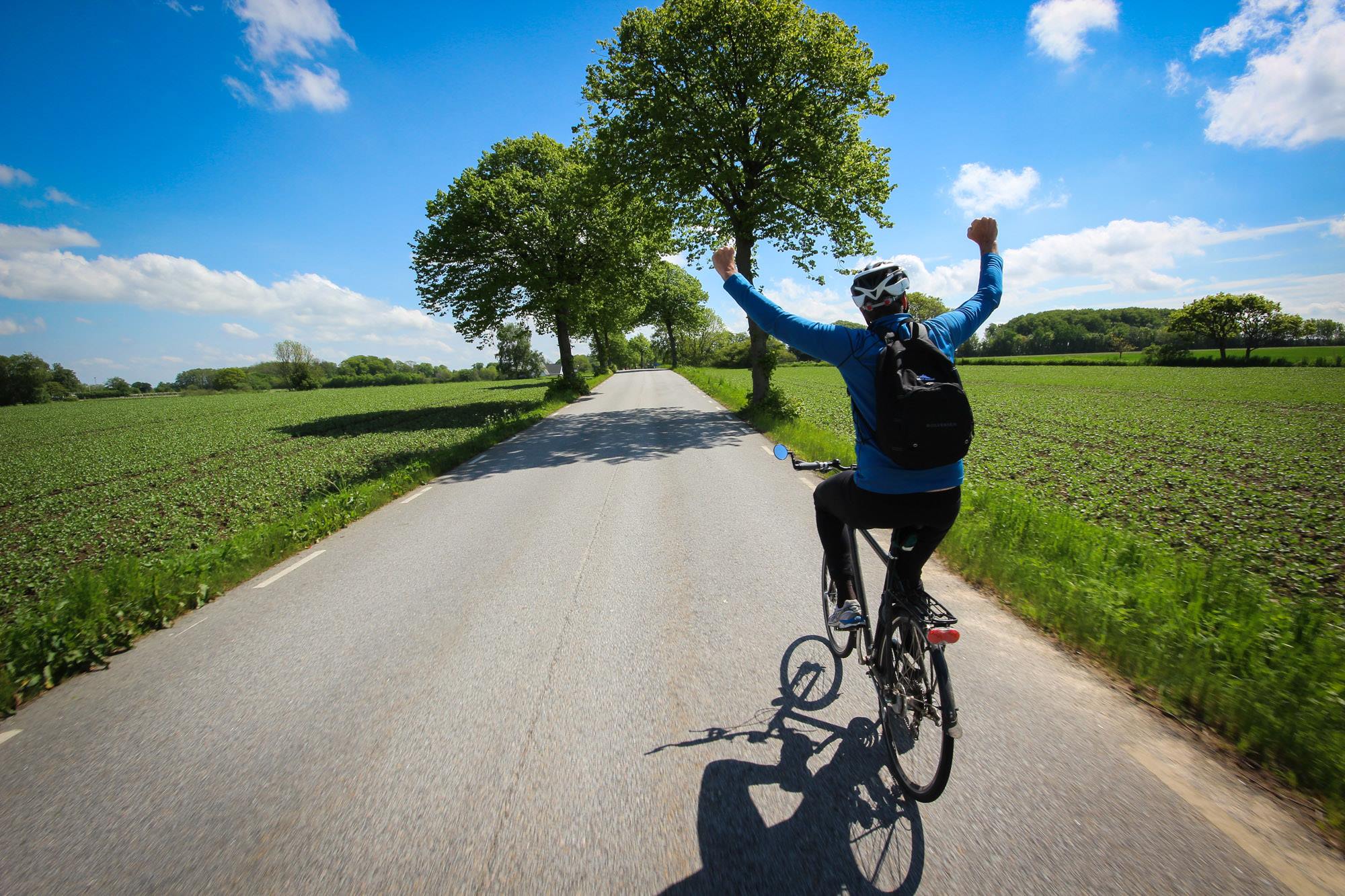 Me, cycling in Sweden in 2014. From my teen years, I've always found getting to know new destinations is best by bike.